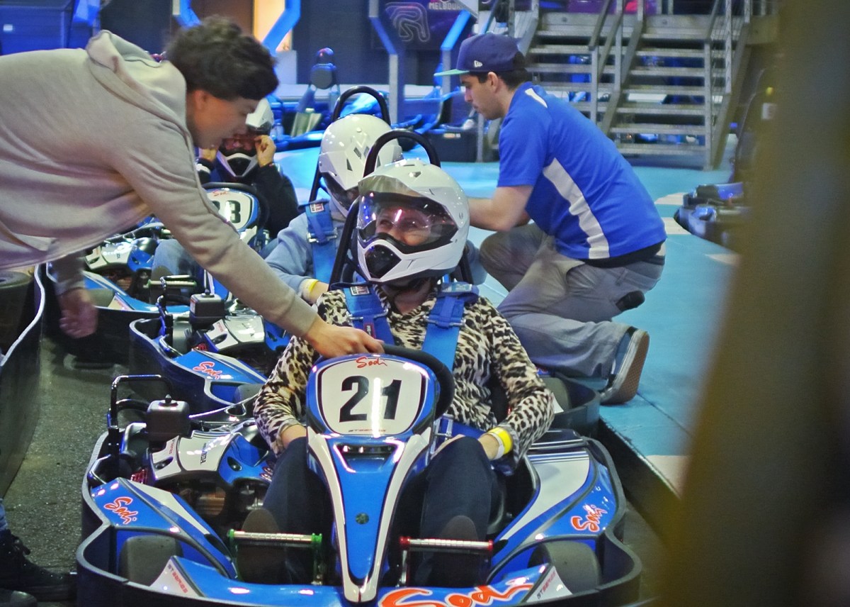 Pre-race check. "You turn that round thing there!" Nikon 1 V1 24mm f/1.4 (FX) Lens ISO 500, 1/30, f/1.4 